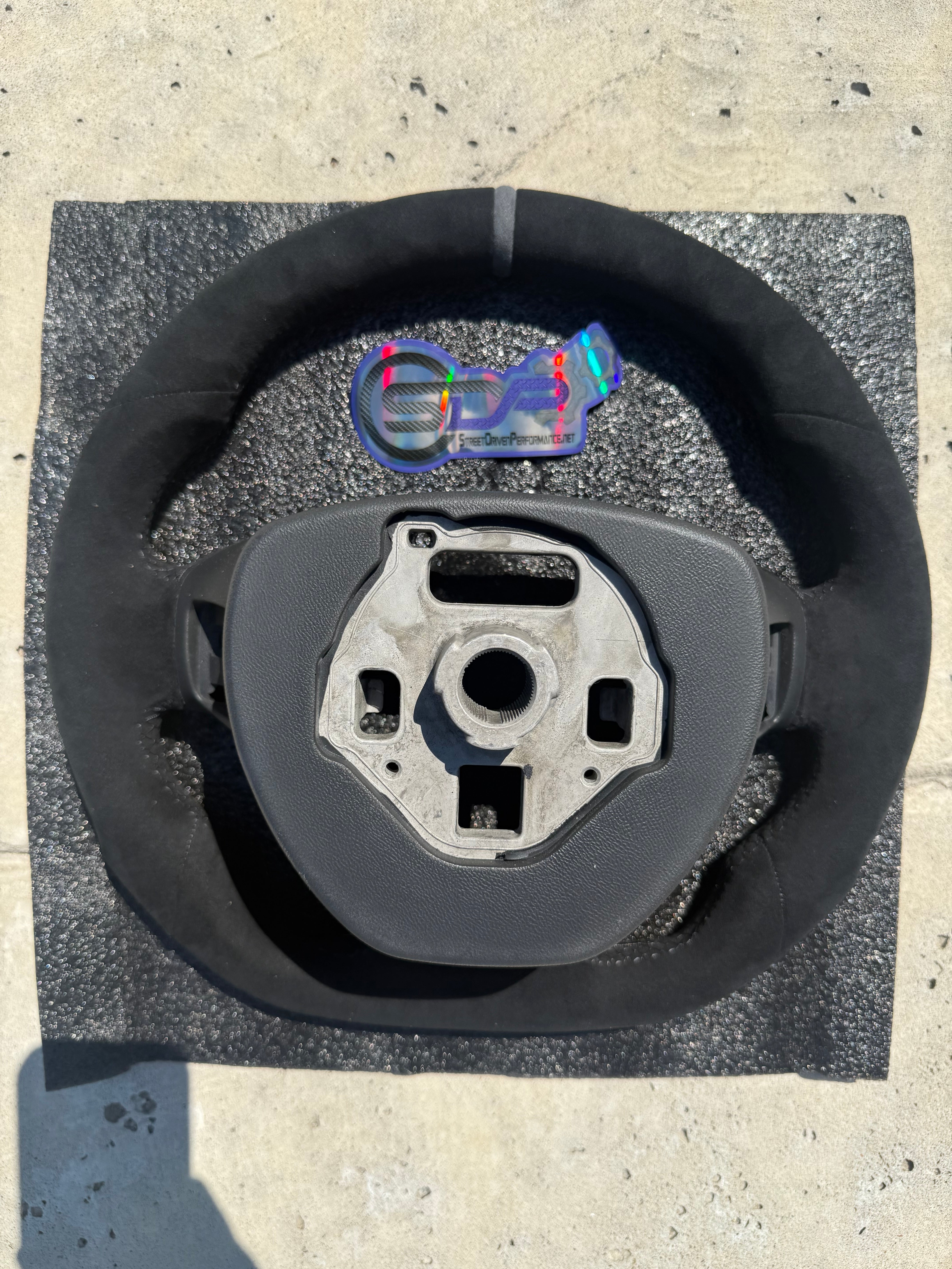 2016 - 2024+ 6th Gen Camaro Carbon Fiber / Alcantara Suede Steering Wheel with badge cut out at bottom